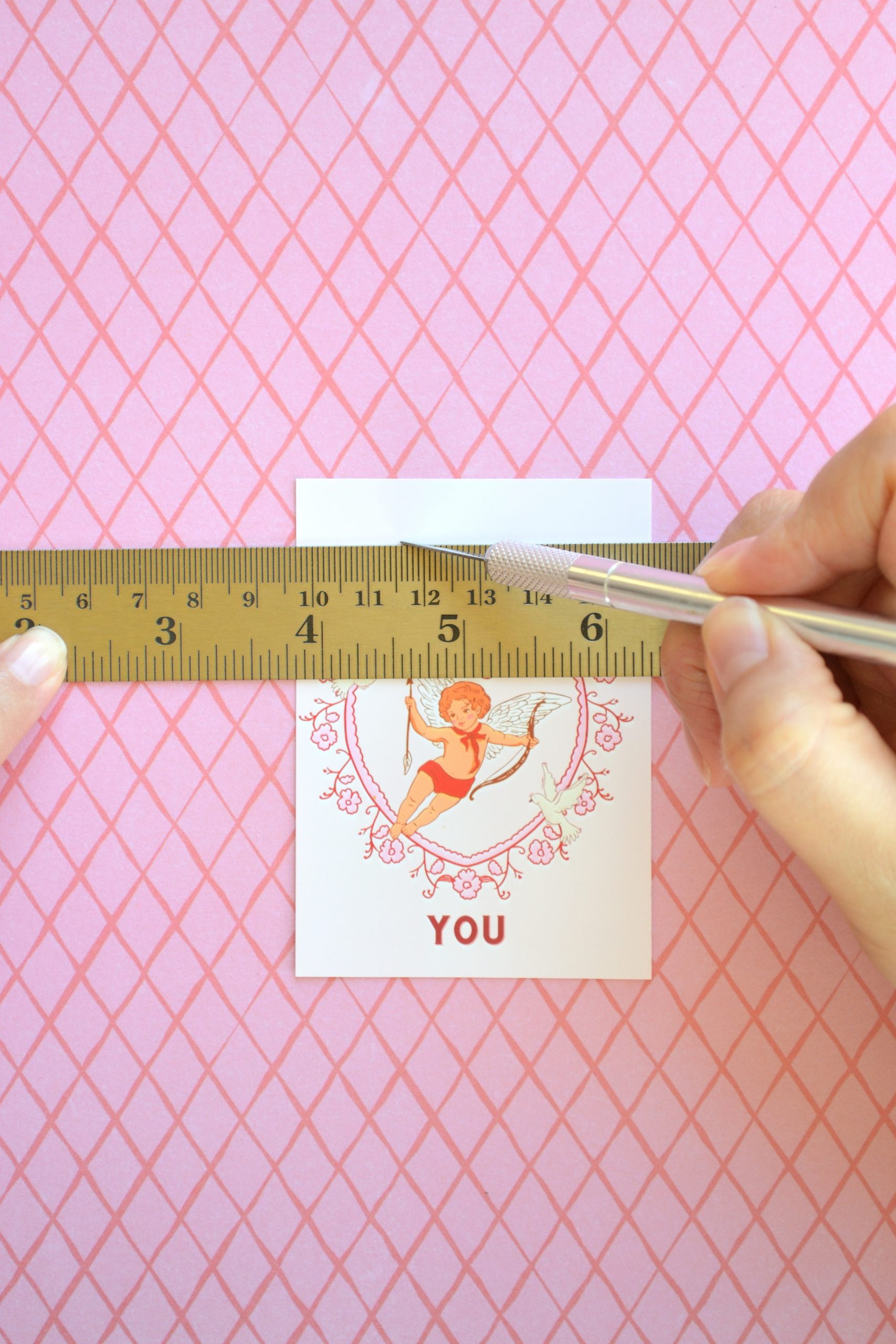 Cutting a Slit into a Valentine's Day Card for a Lollipop